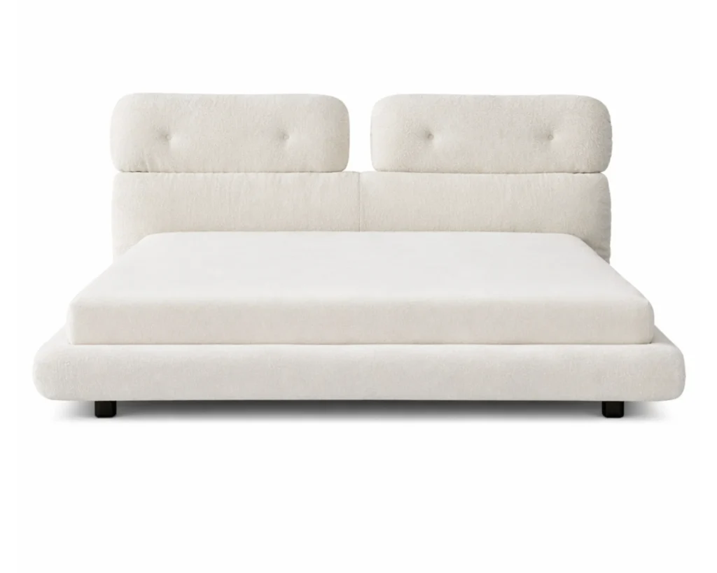 מיטה מרופדת בקווים רכים