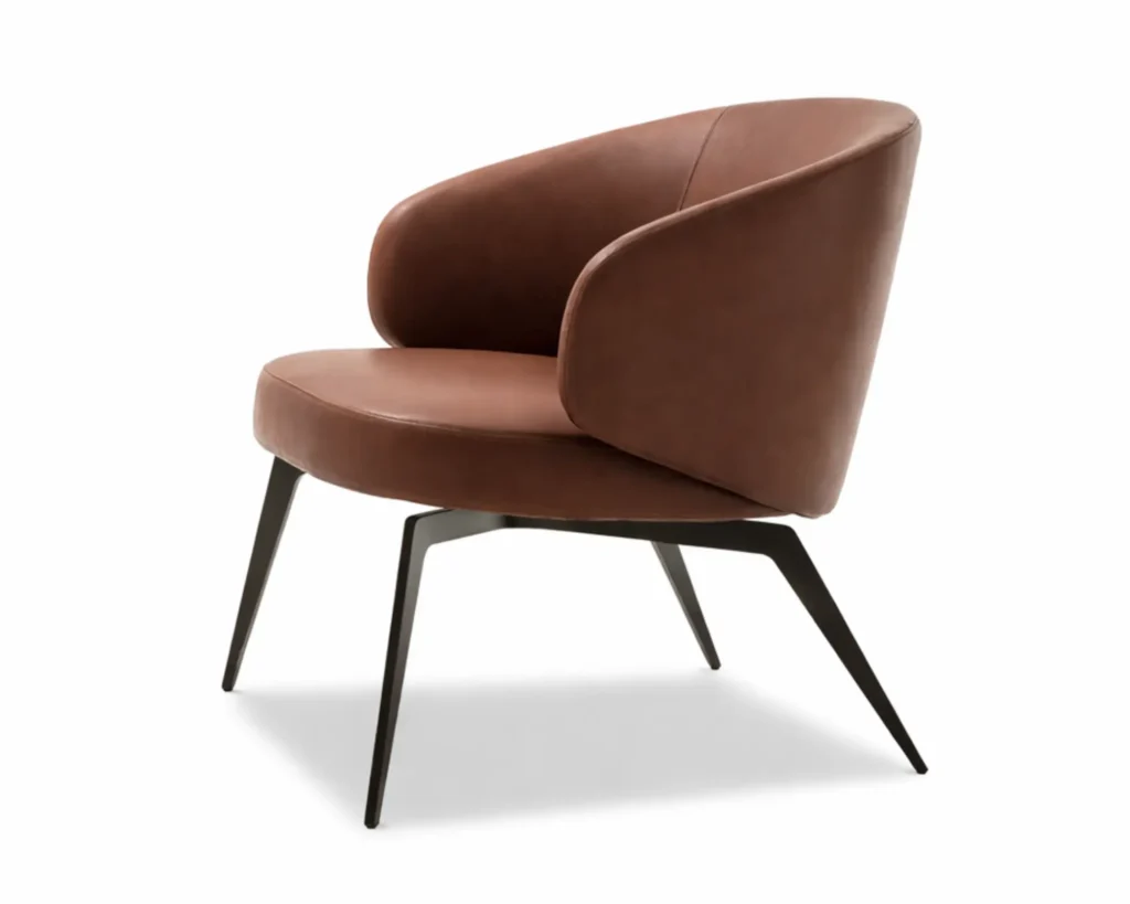 כורסה מעוצבת מעור עם רגלי ברזל שחורות